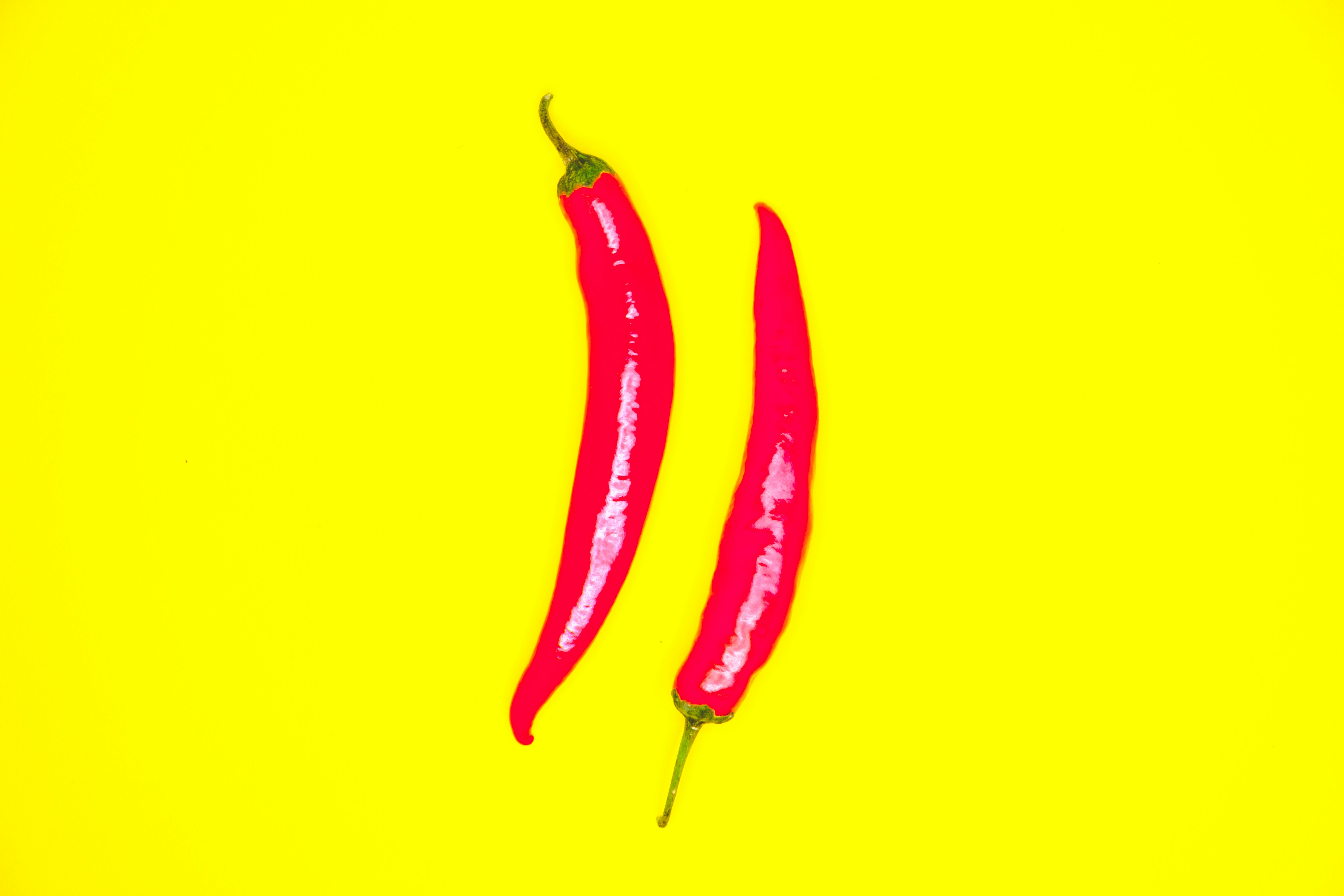 red chili on yellow background